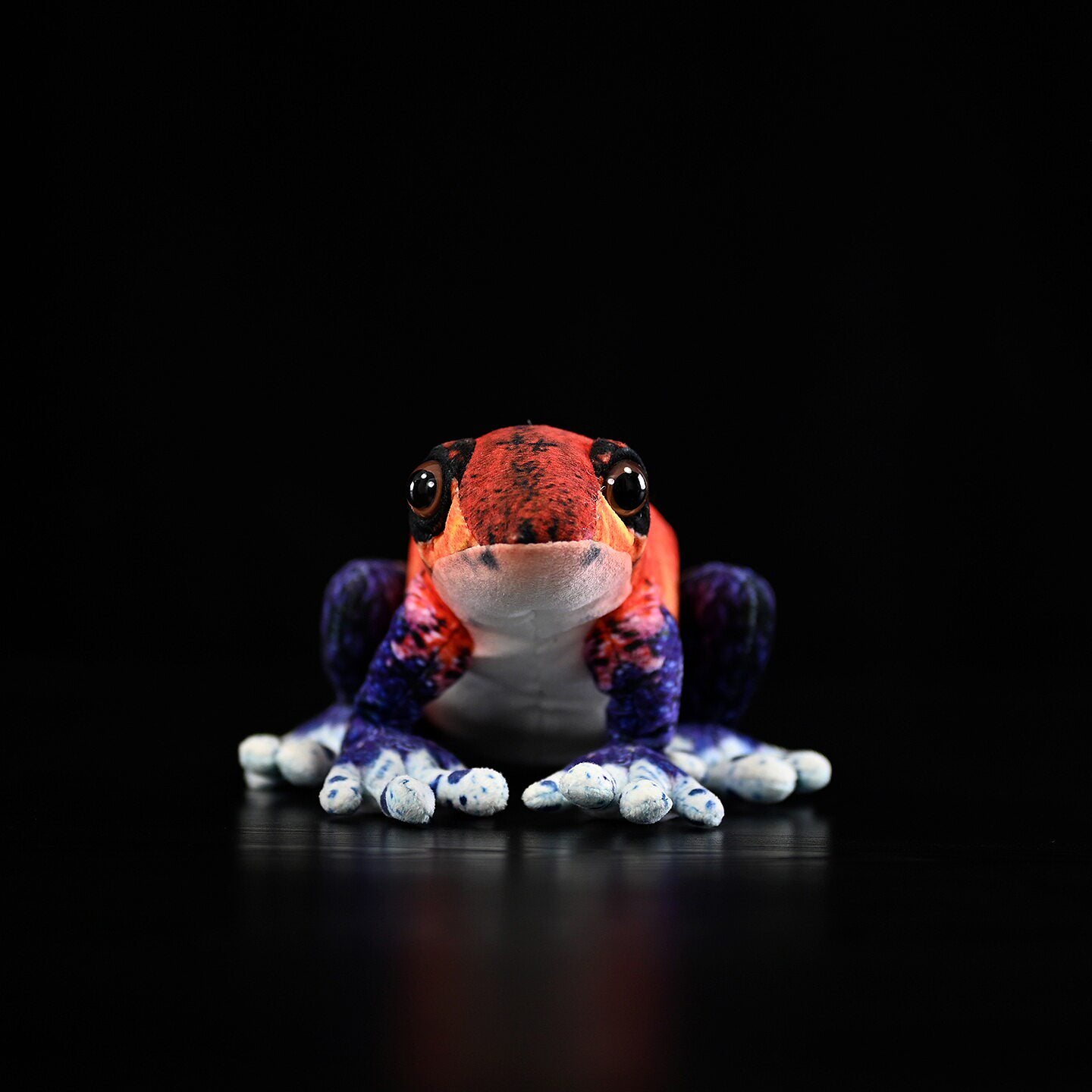 Front view of lifelike Strawberry Poison Dart Frog Plush in Blue Jeans Morph, perfect for nature enthusiast