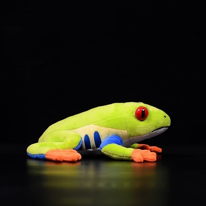Profile view of Red-Eyed Tree Frog plush showcasing detailed blue, green, and orange features