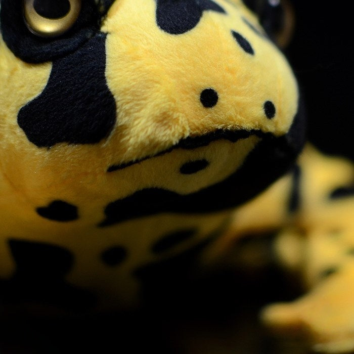 Close-up of the frog plush’s mouth and nose, emphasizing realistic stitching and textures