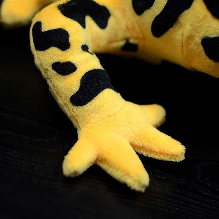 Close-up of Yellow-Banded Poison Dart Frog plush’s hand, showing soft fabric and vivid details