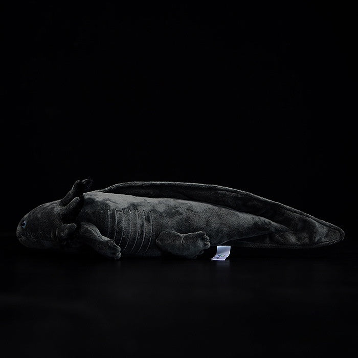 Side view of Black Melanoid Axolotl Plush Toy by SoftDaysLab, showcasing sleek and lifelike features