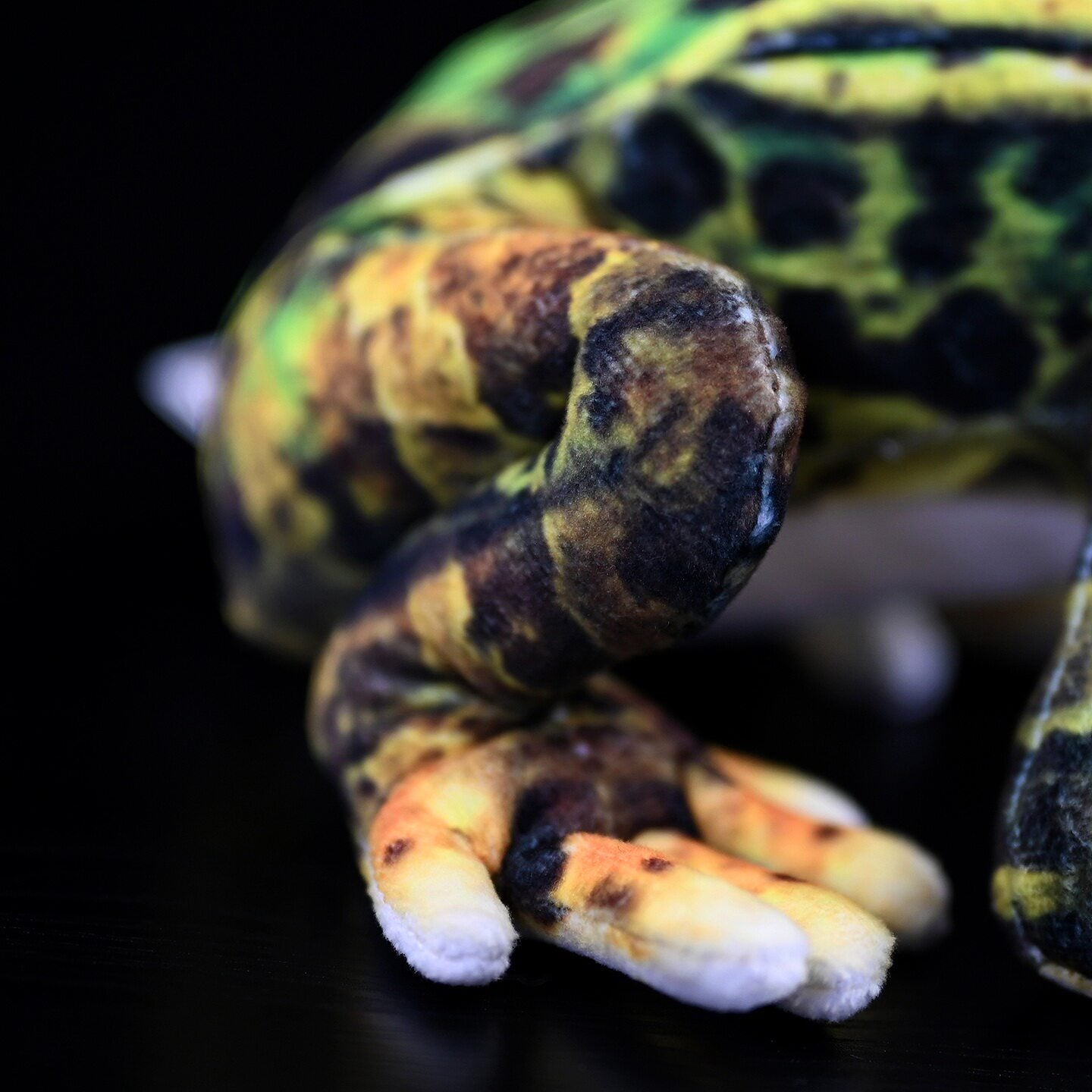 Focus on the Japanese Black-spotted Pond Frog Plush’s legs, crafted with naturalistic coloring and textures