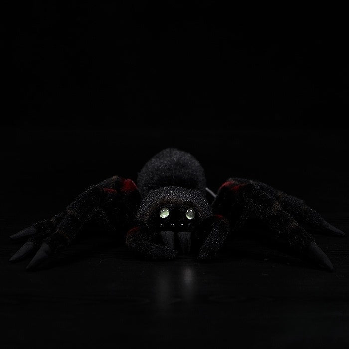 Realistic Mexican Redknee Tarantula plush by SoftDaysLab, lifelike design with glowing eyes and vibrant colors