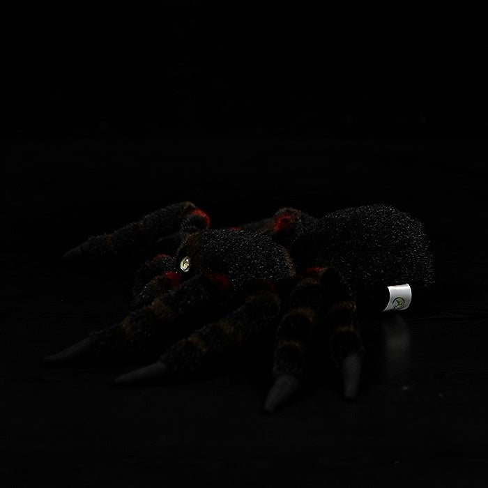 Mexican Giant Red Knee Tarantula plush, highlighting detailed textured legs and realistic spider shape