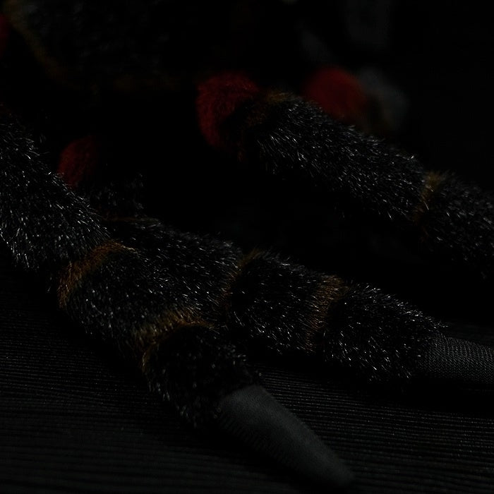 Mexican Giant Red Knee Tarantula plush, close-up of vibrant red and black leg textures with lifelike details