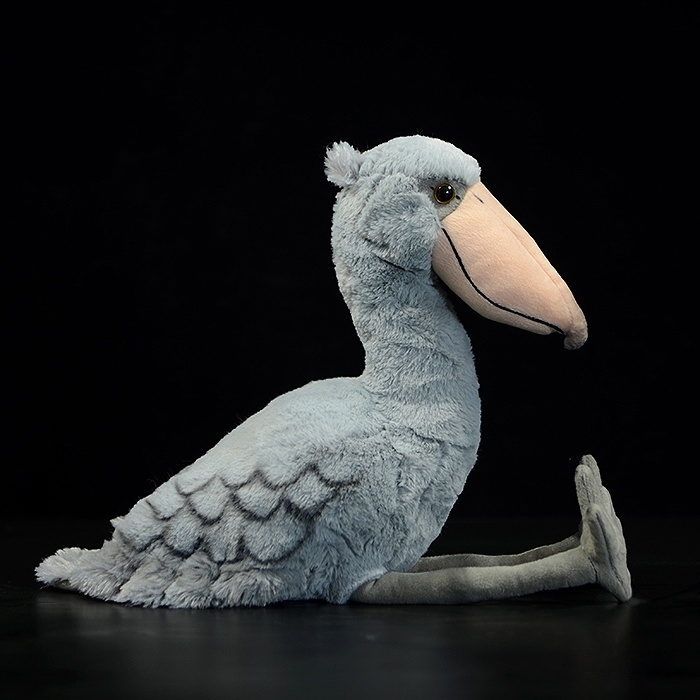 Side view of Shoebill Stork plush toy, showcasing lifelike features and soft textures for bird lovers