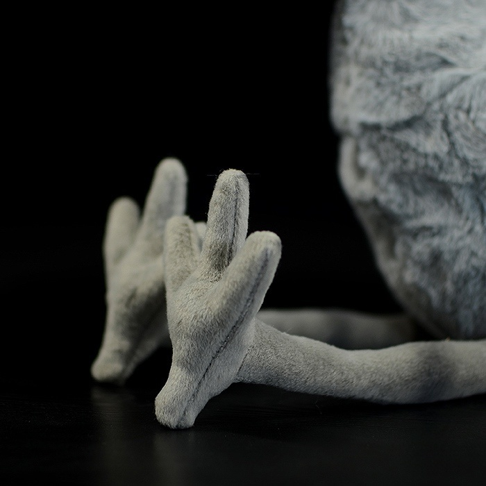 Close-up of Shoebill Stork plush toy’s realistic feet, crafted with soft fabric for a lifelike appearance