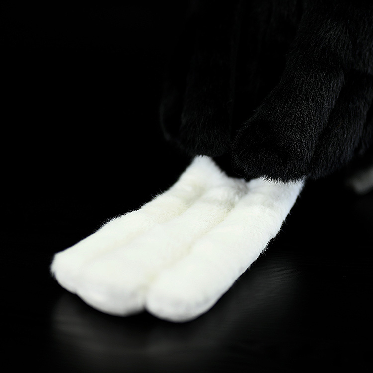 Fluffy white tail of Wreathed Hornbill plush toy, showcasing attention to detail in design