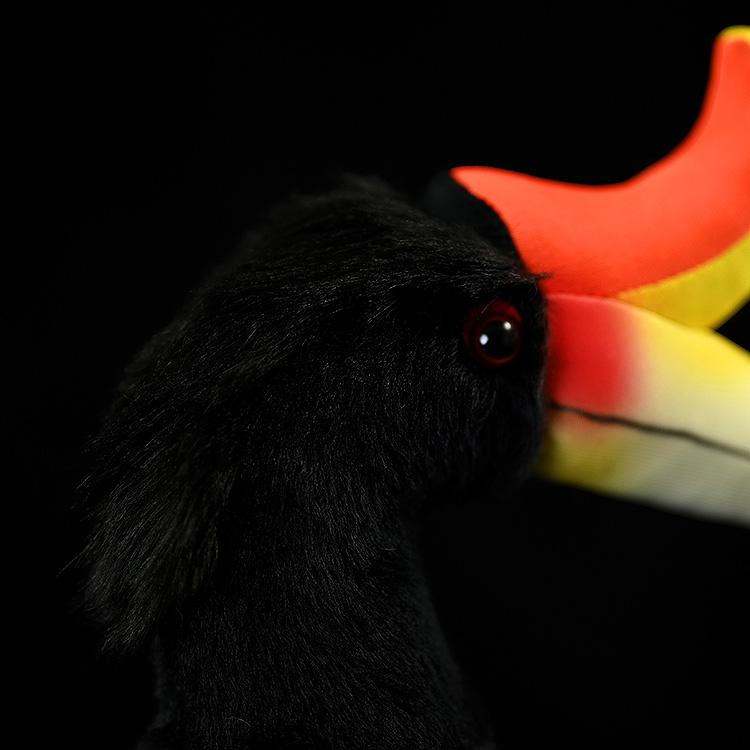 Close-up of the Rhinoceros Hornbill’s head and vibrant casque on a lifelike plush toy
