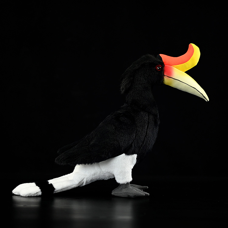 Side view of a lifelike Rhinoceros Hornbill plush toy by SoftDaysLab, featuring vibrant details