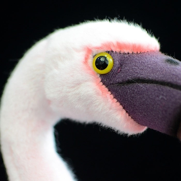 Flamingo plush toy’s bright yellow eyes and realistic head design, perfect for nature enthusiasts