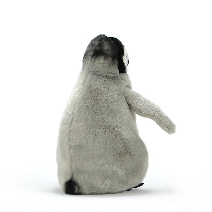 Back view of realistic emperor penguin chick plush toy, soft and perfect for animal lovers
