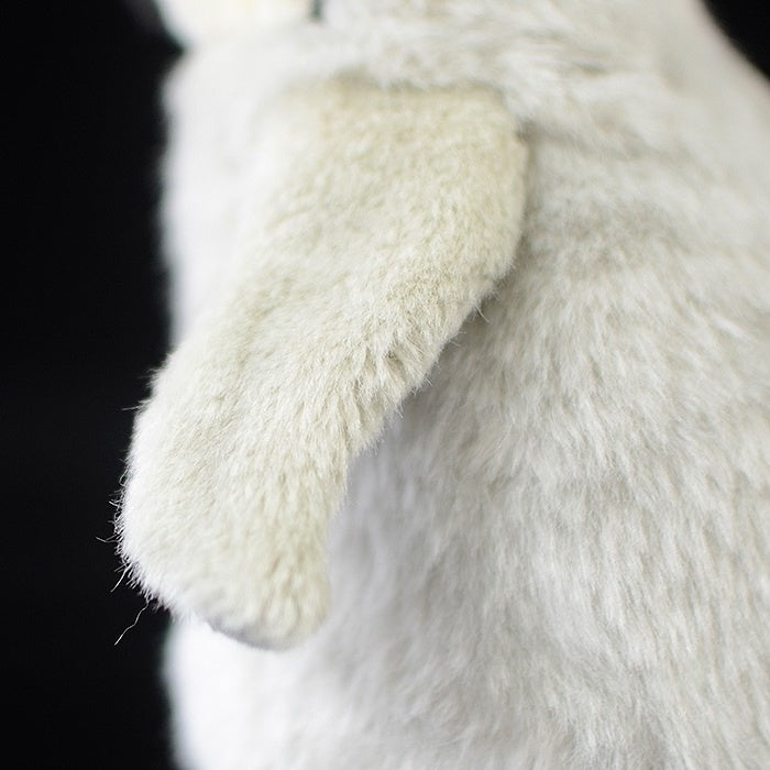 Fluffy wing detail of an emperor penguin chick plush toy, crafted from ultra-soft materials for comfort