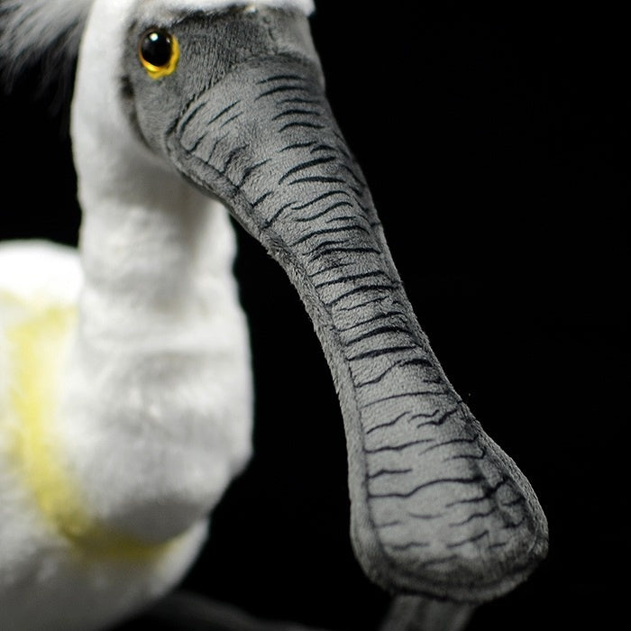 Close-up of black-faced spoonbill plush toy’s textured bill, a lifelike bird replica by SoftDaysLab