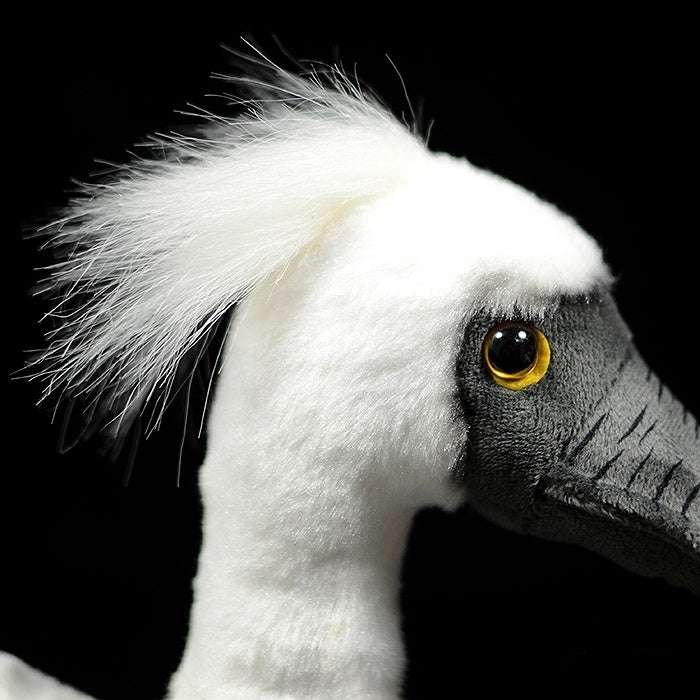 Close-up of black-faced spoonbill plush toy’s head and crest, highlighting detailed craftsmanship by SoftDaysLab