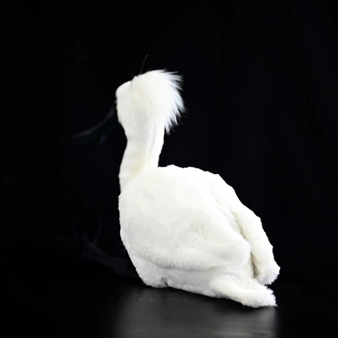 Rear view of the Black-faced Spoonbill Plush Toy showcasing its soft white feathers and plush tail