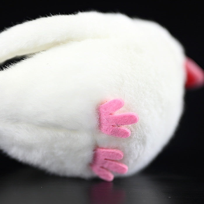 Bottom view of plush showing White Java Sparrow bird's pink felt feet for extra realistic detail