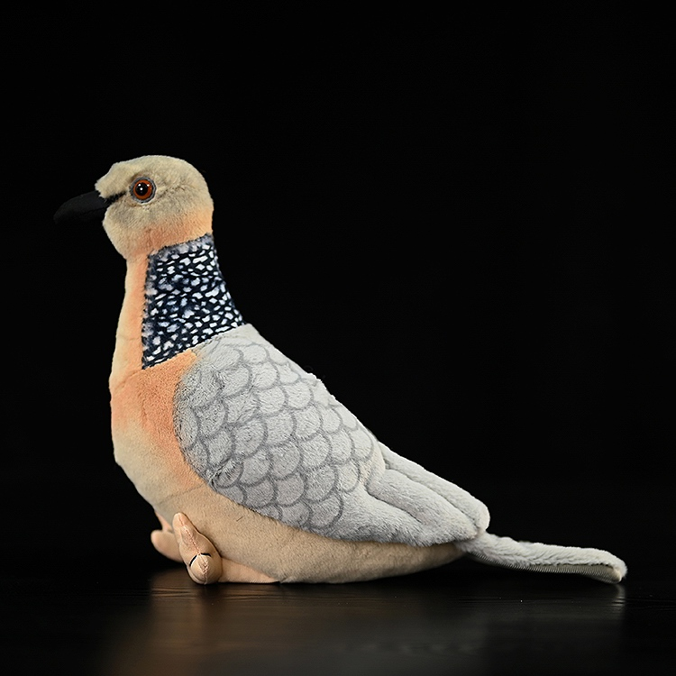 Realistic left-side profile of a Spotted Dove plush with soft texture and intricate scale-like wing design