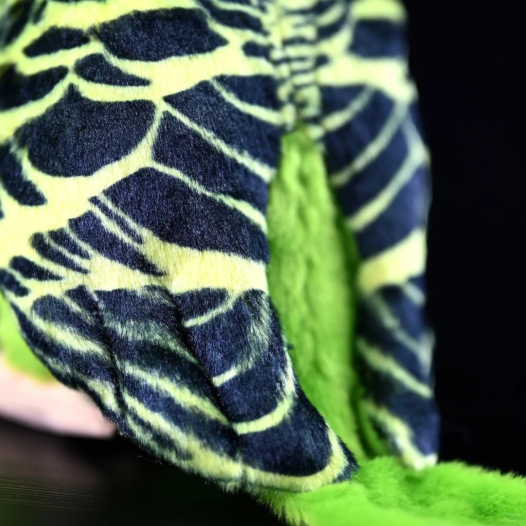 Detail shot of the Budgerigar Plush Toy’s black and green wing patterns with soft texture