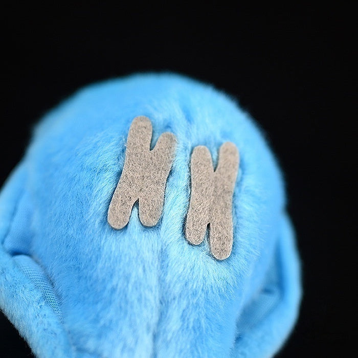 Top view of the Blue Lovebird plush toy, highlighting its soft blue feathers and cute details