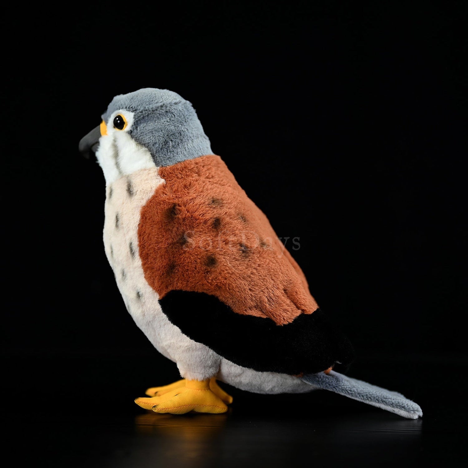 Profile view of Eurasian Kestrel Plush Toy, highlighting its authentic wing patterns and elegant stance