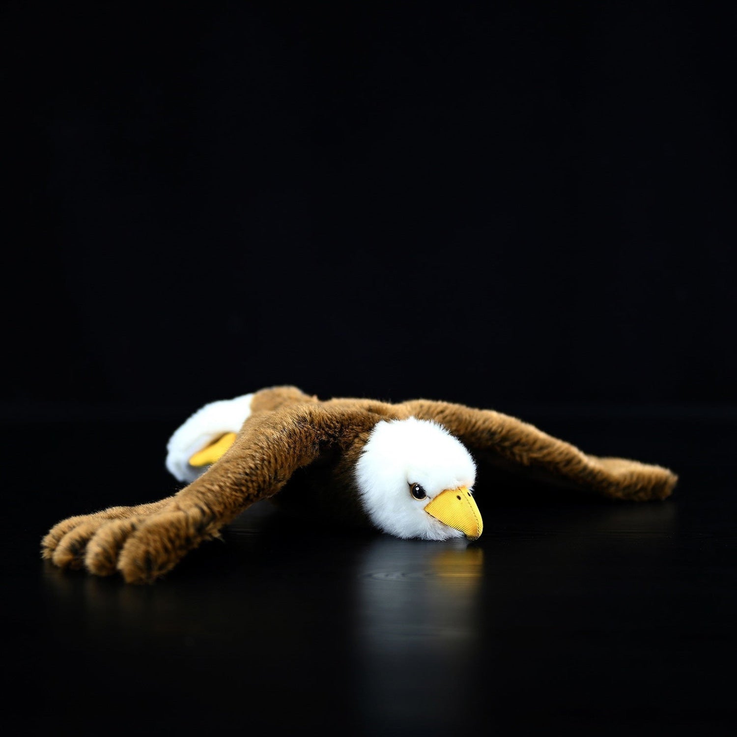 Close frontal perspective of a realistic Bald Eagle Plush with outstretched wings