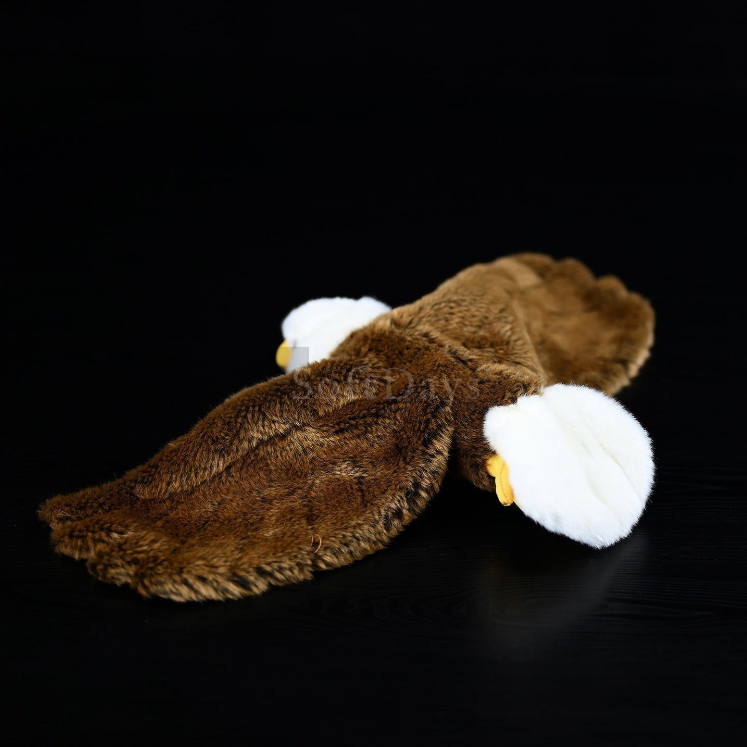 Back view of Bald Eagle Plush showcasing plush brown back and soft white tail