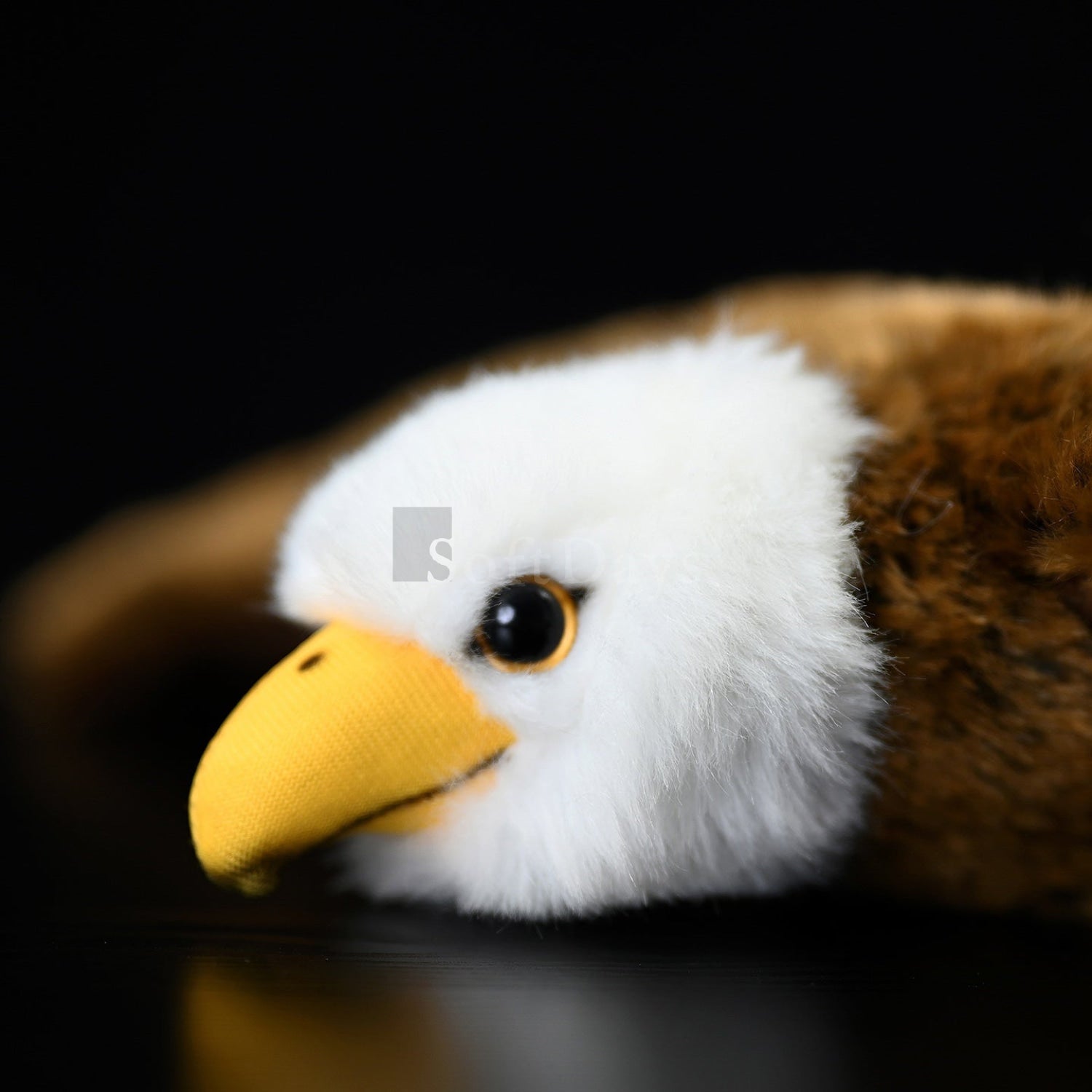Detailed headshot of Plush Bald Eagle's head, highlighting its vibrant yellow beak and lifelike eyes by SoftDaysLab