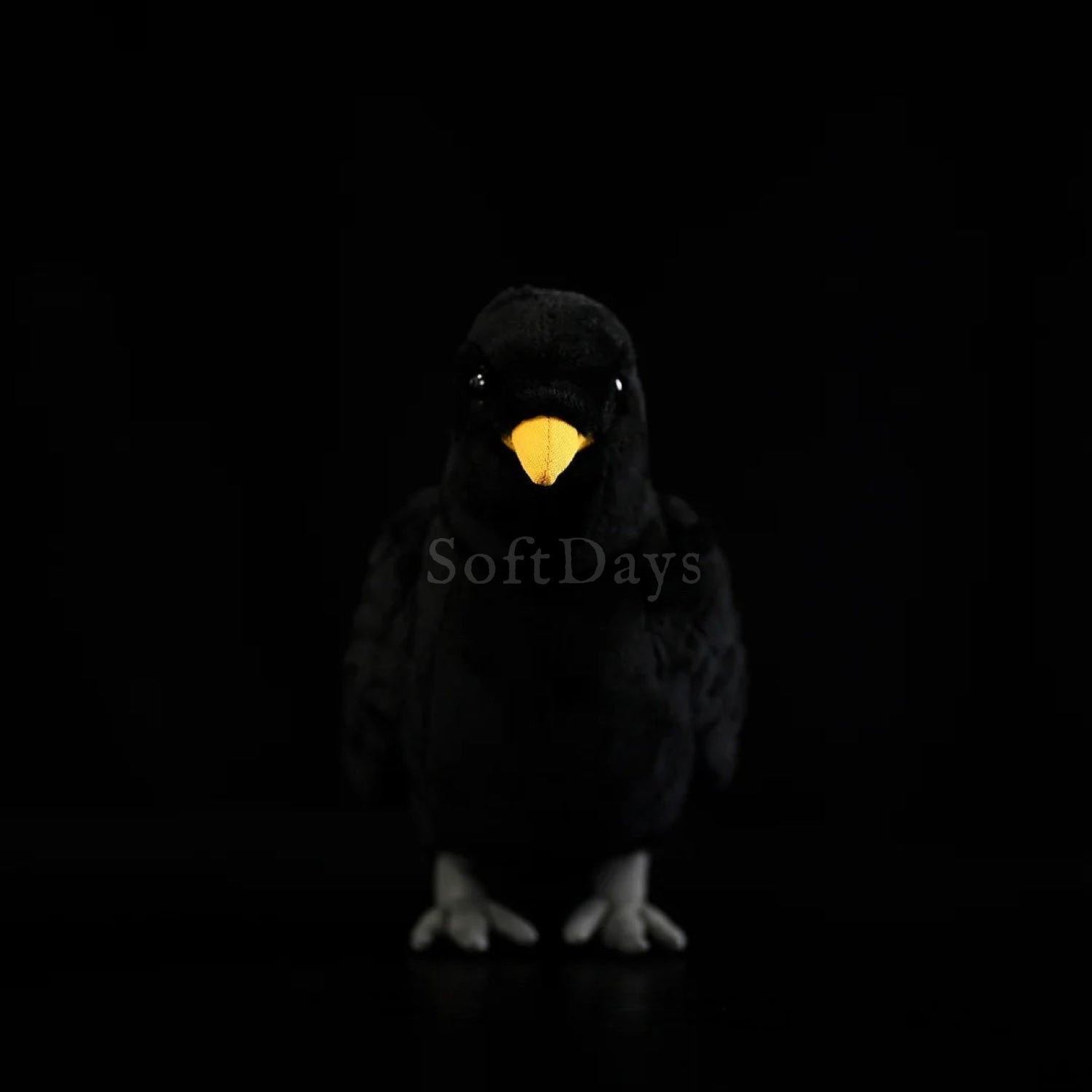 Eurasian Blackbird plush toy featuring a soft black body, bright yellow beak, and lifelike design