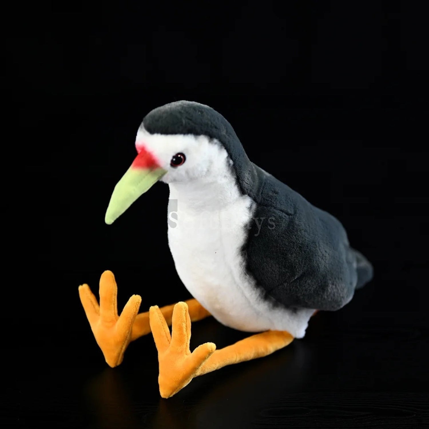 Realistic White-breasted Waterhen plush toy with black and white feathers, a green beak, and orange legs
