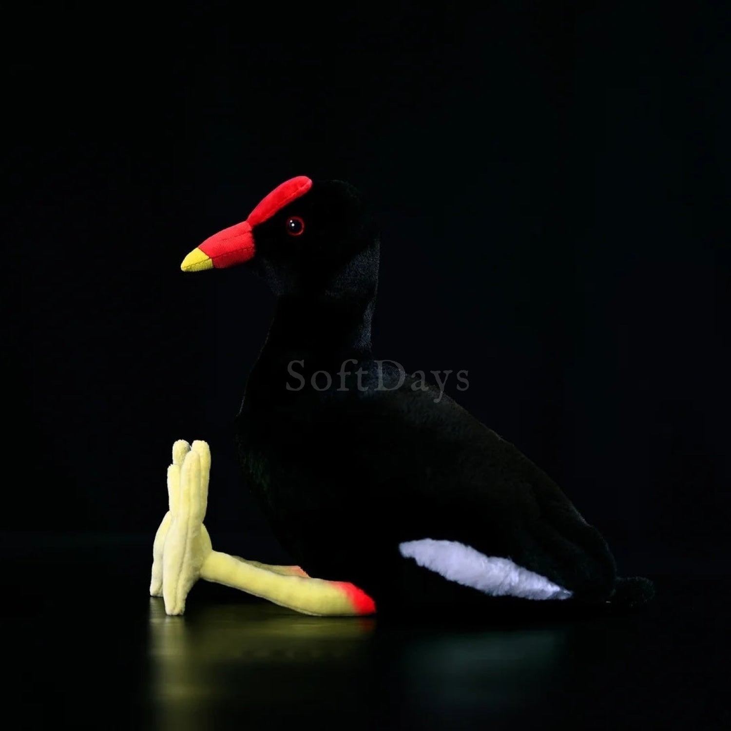 Side profile of a Common Moorhen plush bird, showcasing its realistic colors and soft plush material