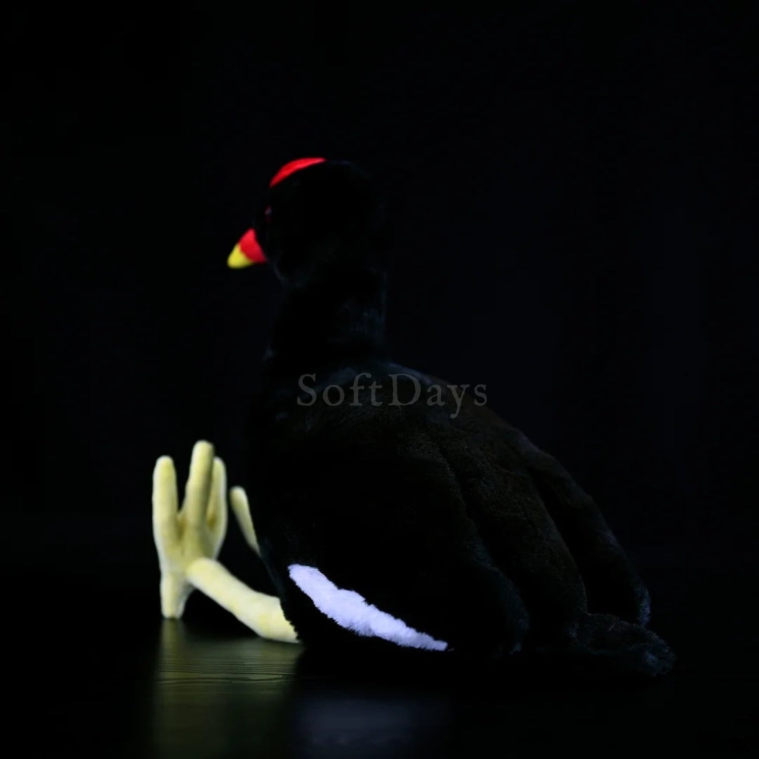 Back view of a Common Moorhen bird plush toy, highlighting its white tail and smooth design