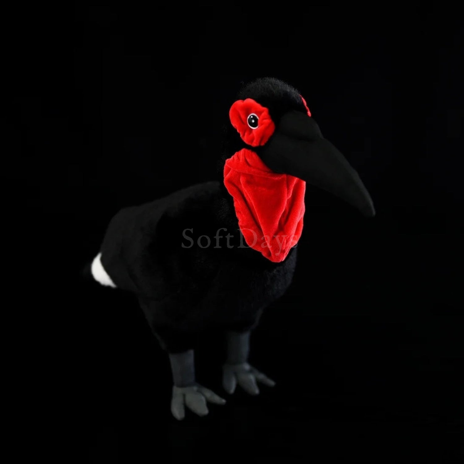Southern Ground Hornbill bird plush toy with soft black texture and vibrant red face details