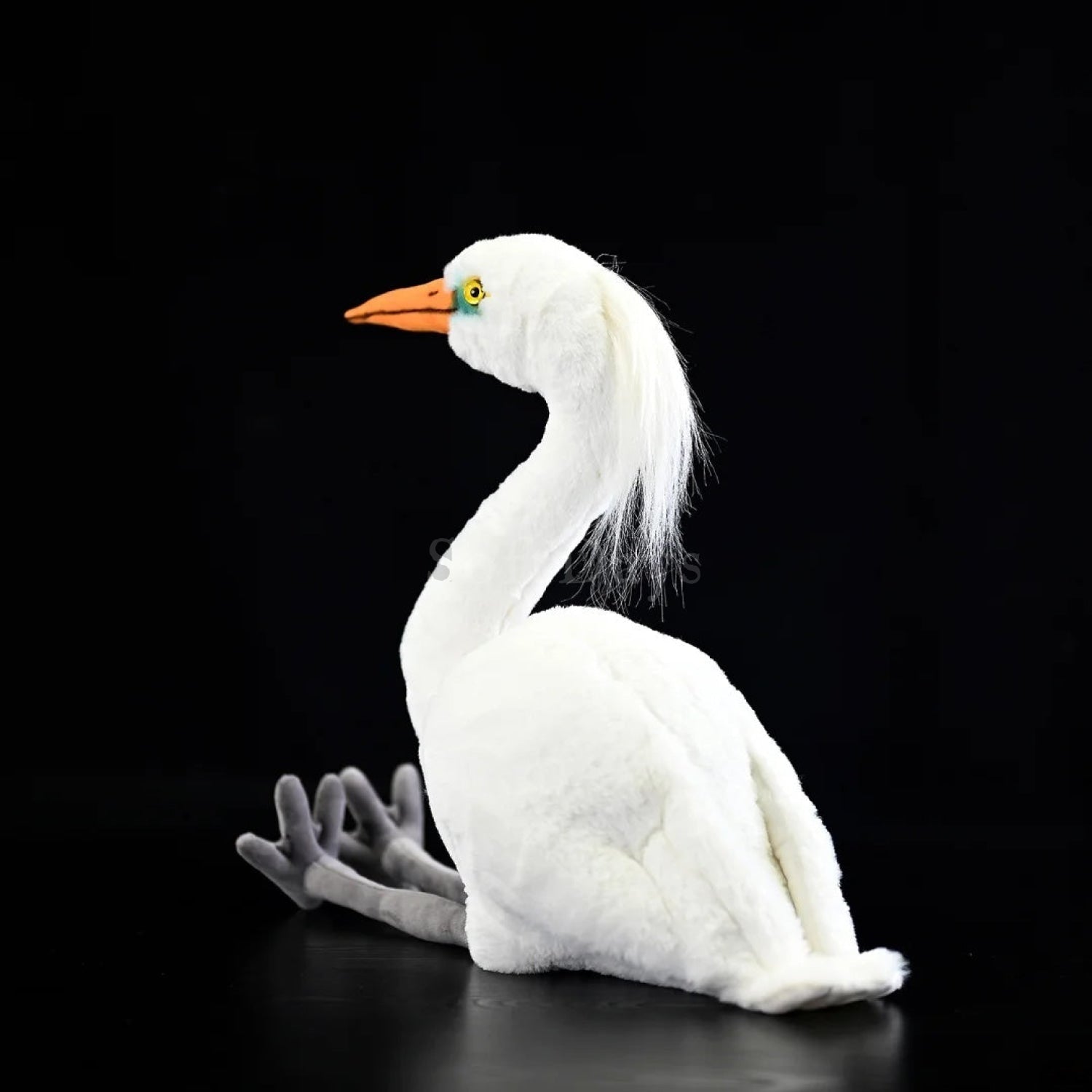 Side view of a Chinese egret bird plush toy with a realistic white body, long crest, and orange beak