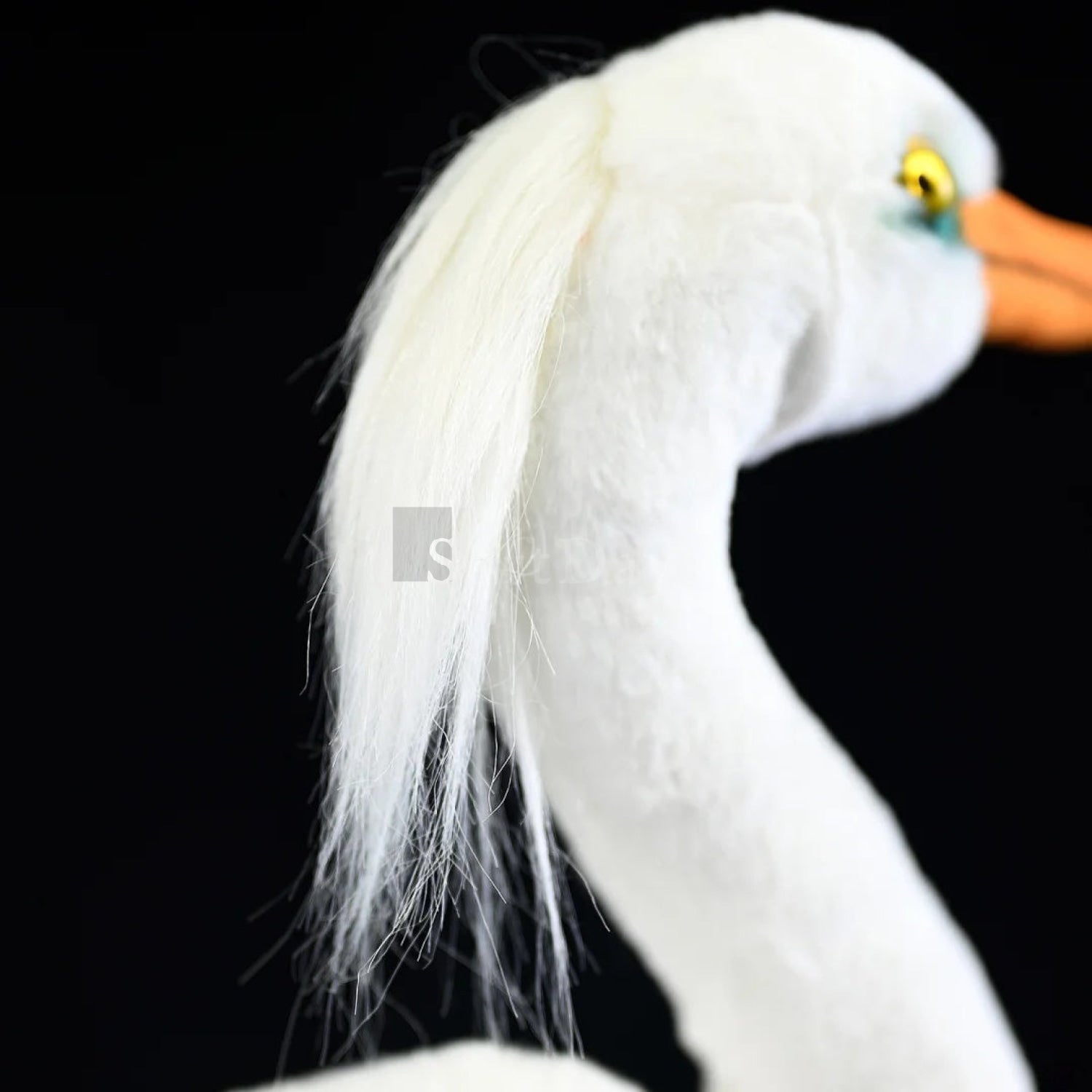 Detailed close-up of the Chinese egret bird plush toy's soft white crest, showcasing lifelike texture