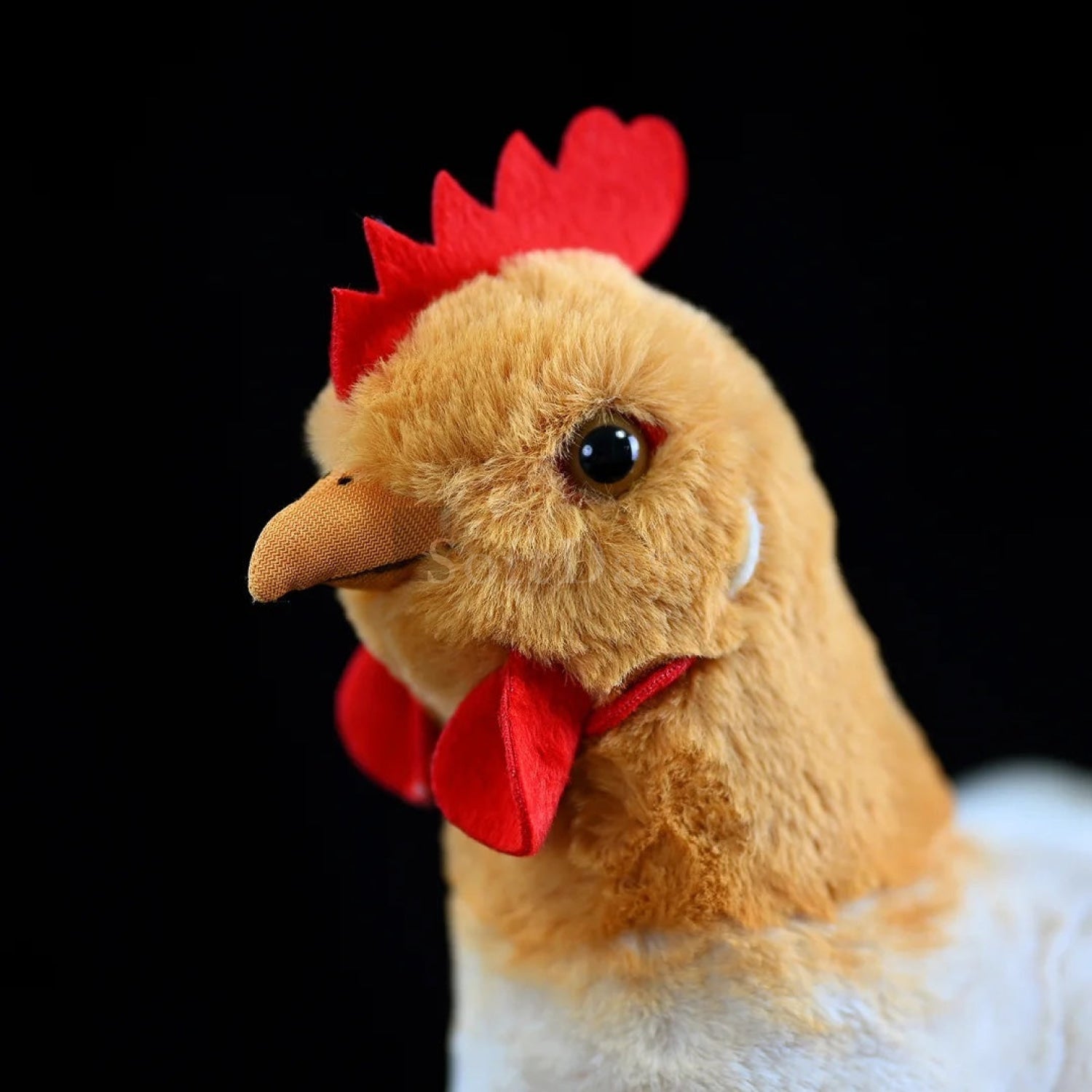 Close-up of hen chicken plush toy’s red comb and orange beak, highlighting its lifelike and adorable design