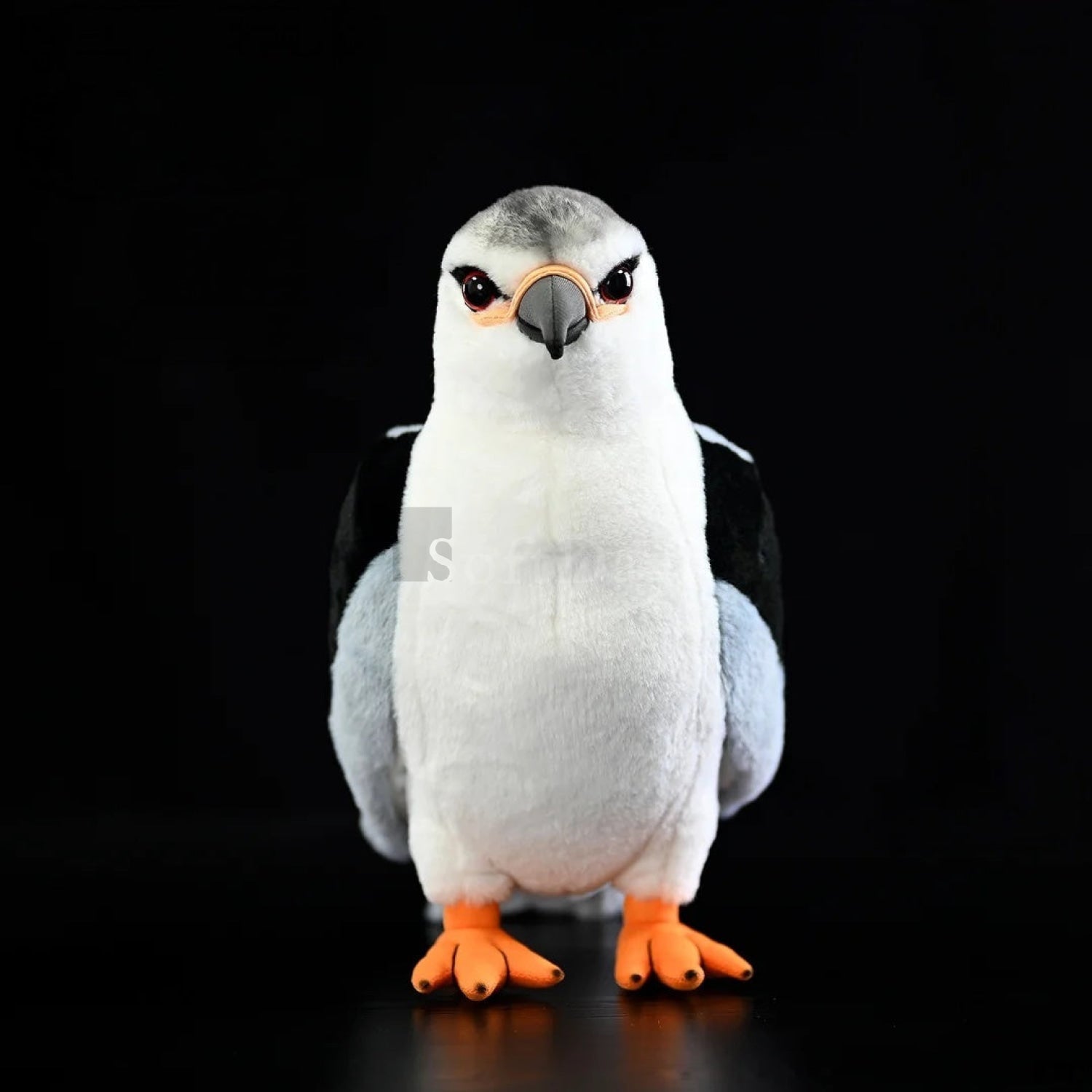 Realistic black-winged kite plush toy showcasing detailed red eyes, white chest, and soft feathers