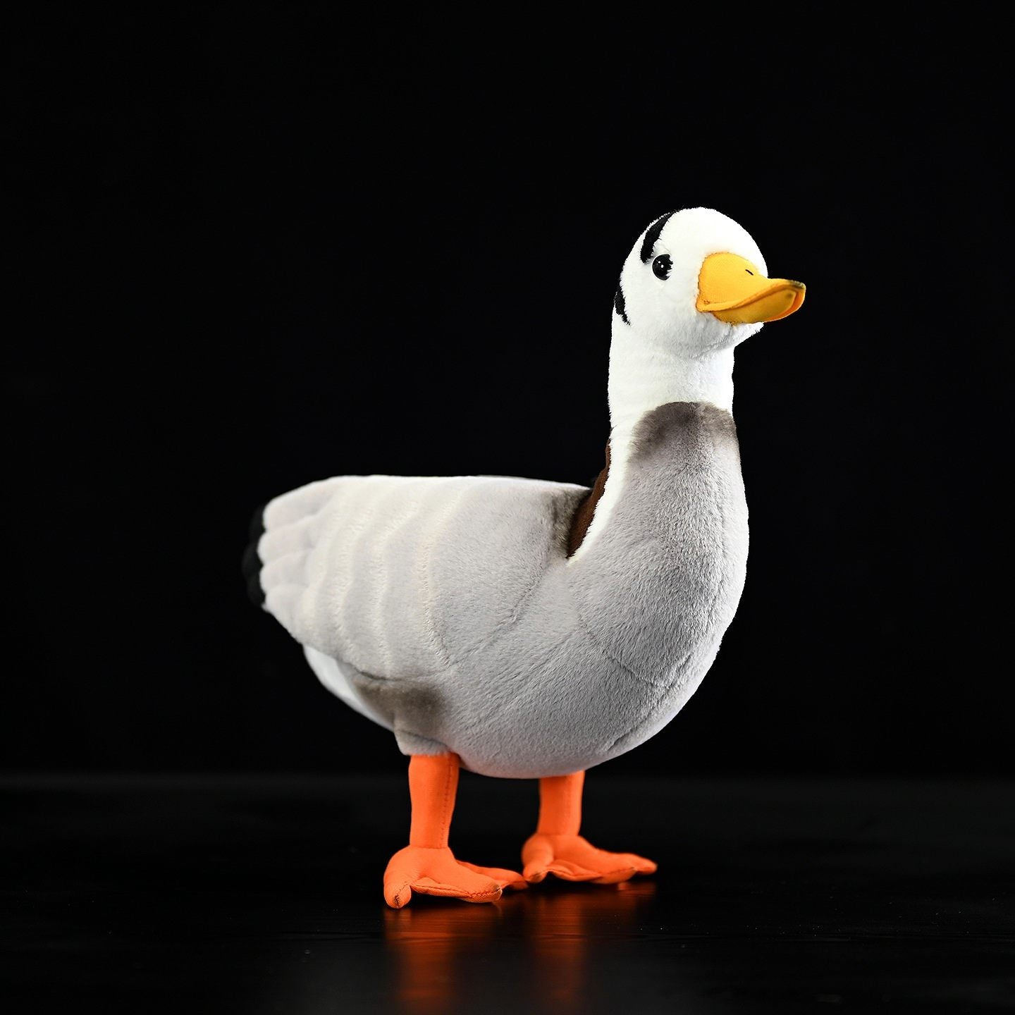 Front-right angle of a realistic Bar-headed Goose plush showcasing soft texture and vibrant colors