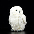 Lifelike snowy owl stuffed animal with detailed design, ideal for home decor or gifting wildlife enthusiasts