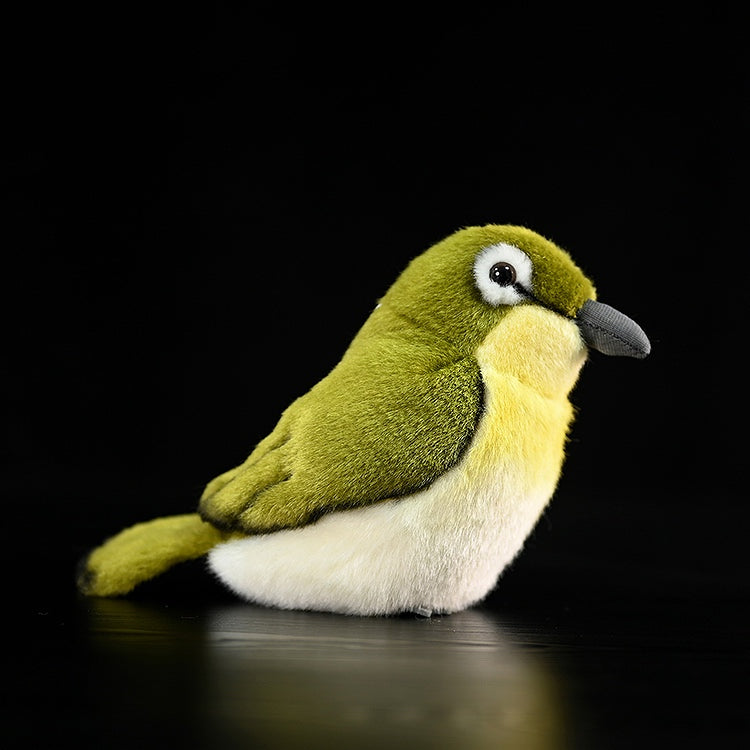 Side view of the Warbling White-Eye plush toy by SoftDaysLab, perfect for bird lovers