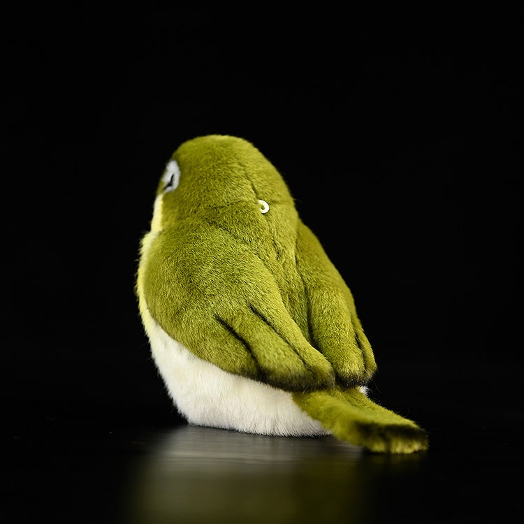 Rear view of the lifelike Warbling White-Eye plush toy with soft feathers and a cute, chubby shape