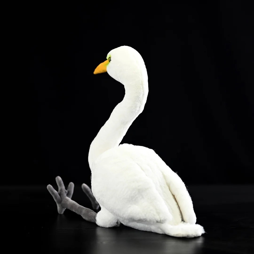 Rear view of a detailed Great White Egret plush toy, highlighting its elegant white feathers
