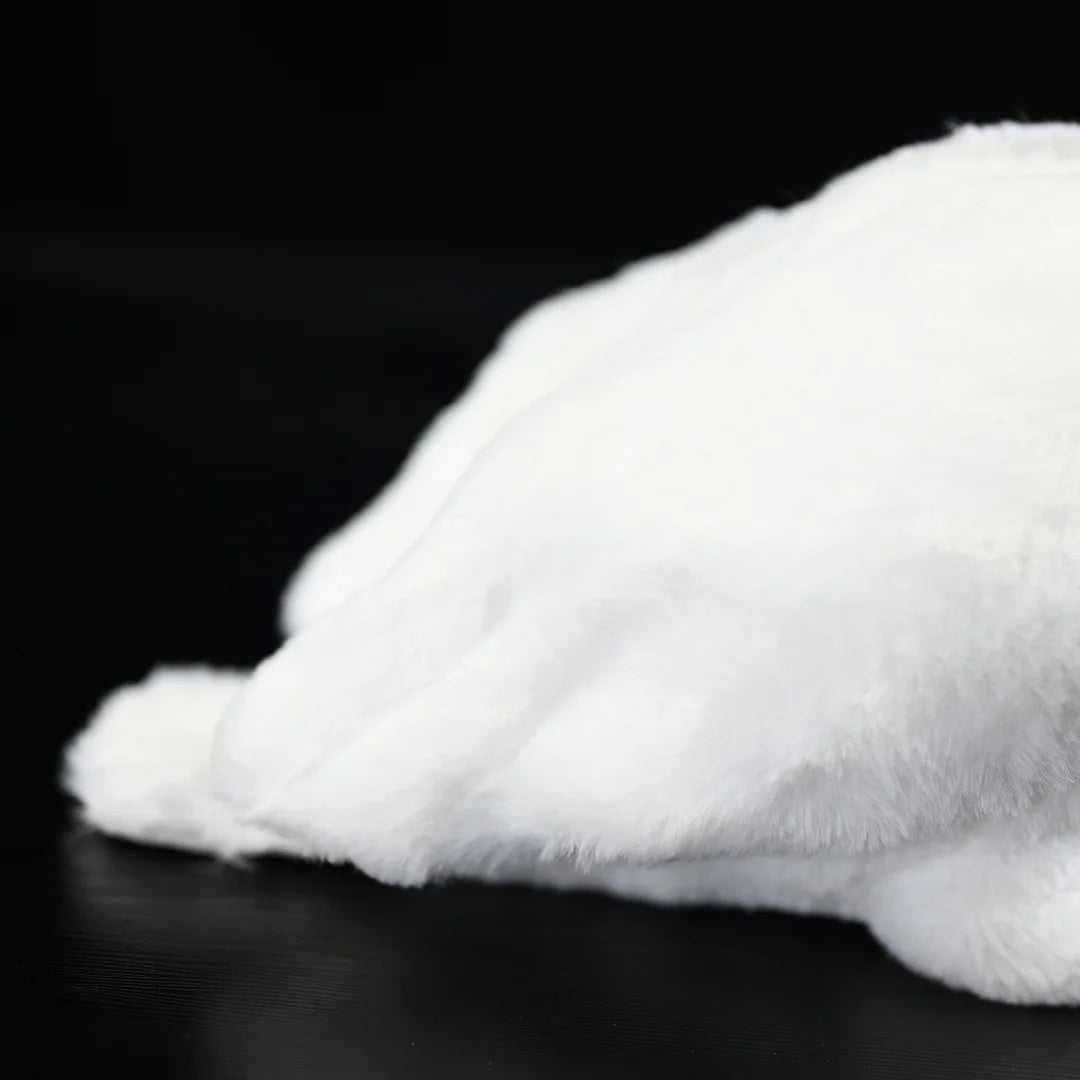 Close-up of the plush egret's soft white feathers, designed to mimic real Great White Egret plumage