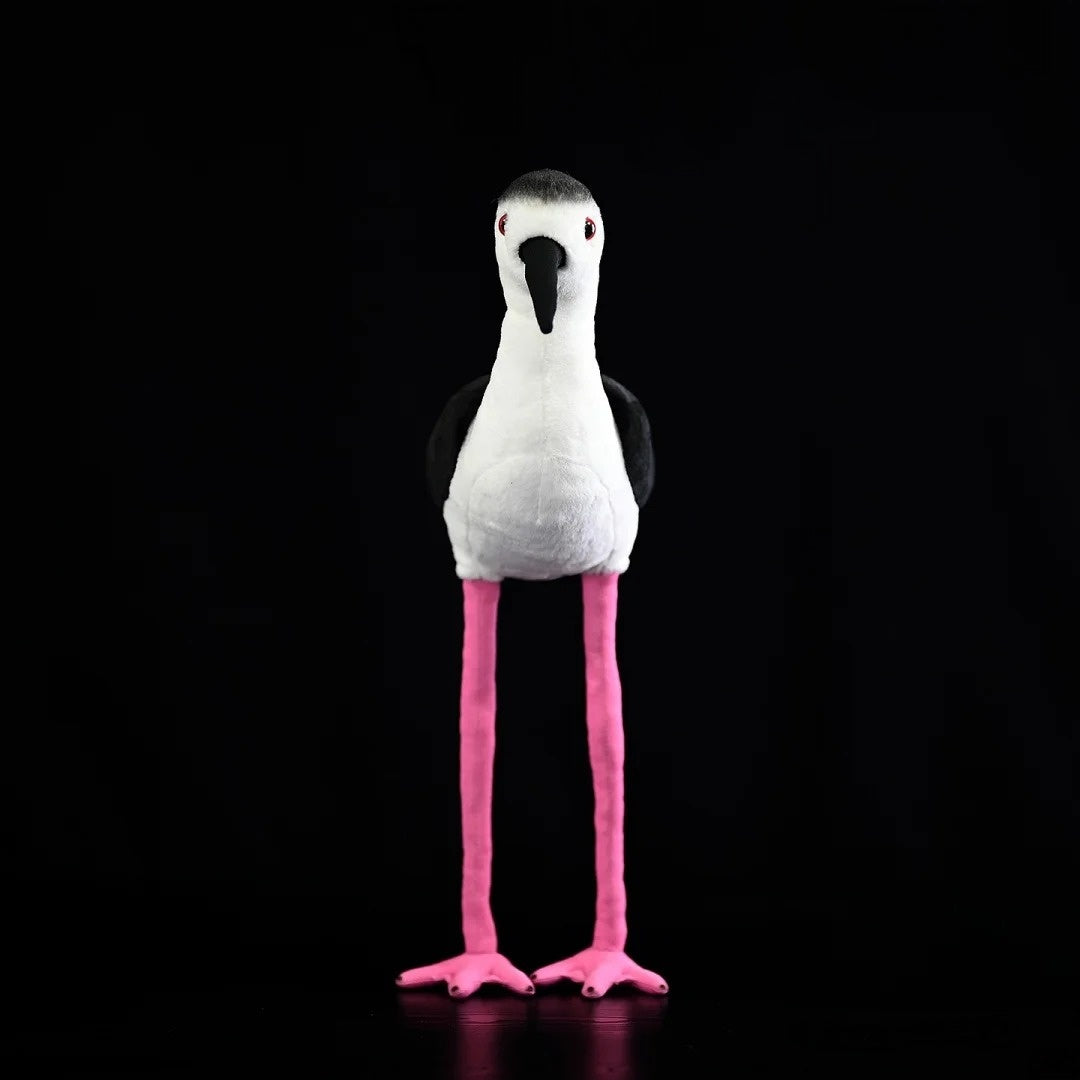 Front view of the Black-winged Stilt plush toy, showing its black-and-white body and lifelike design