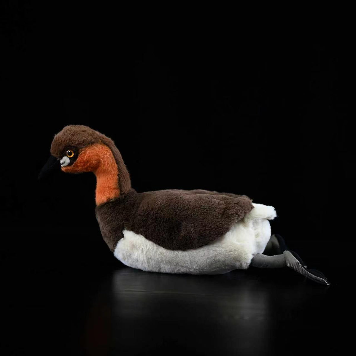 Side profile of Little Grebe stuffed bird toy showcasing its detailed brown and orange plumage