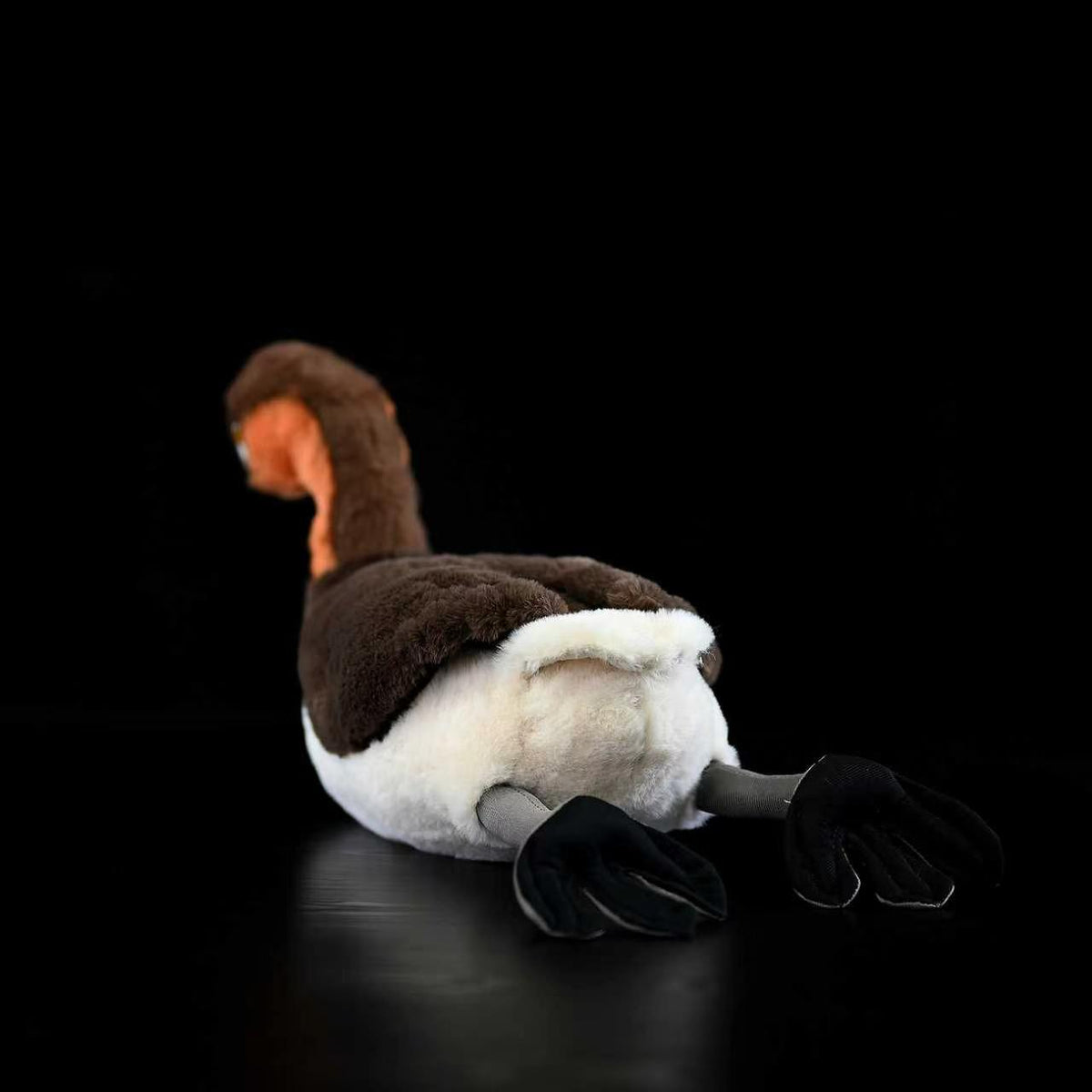 Side profile of Little Grebe stuffed bird toy showcasing its detailed brown and orange plumage