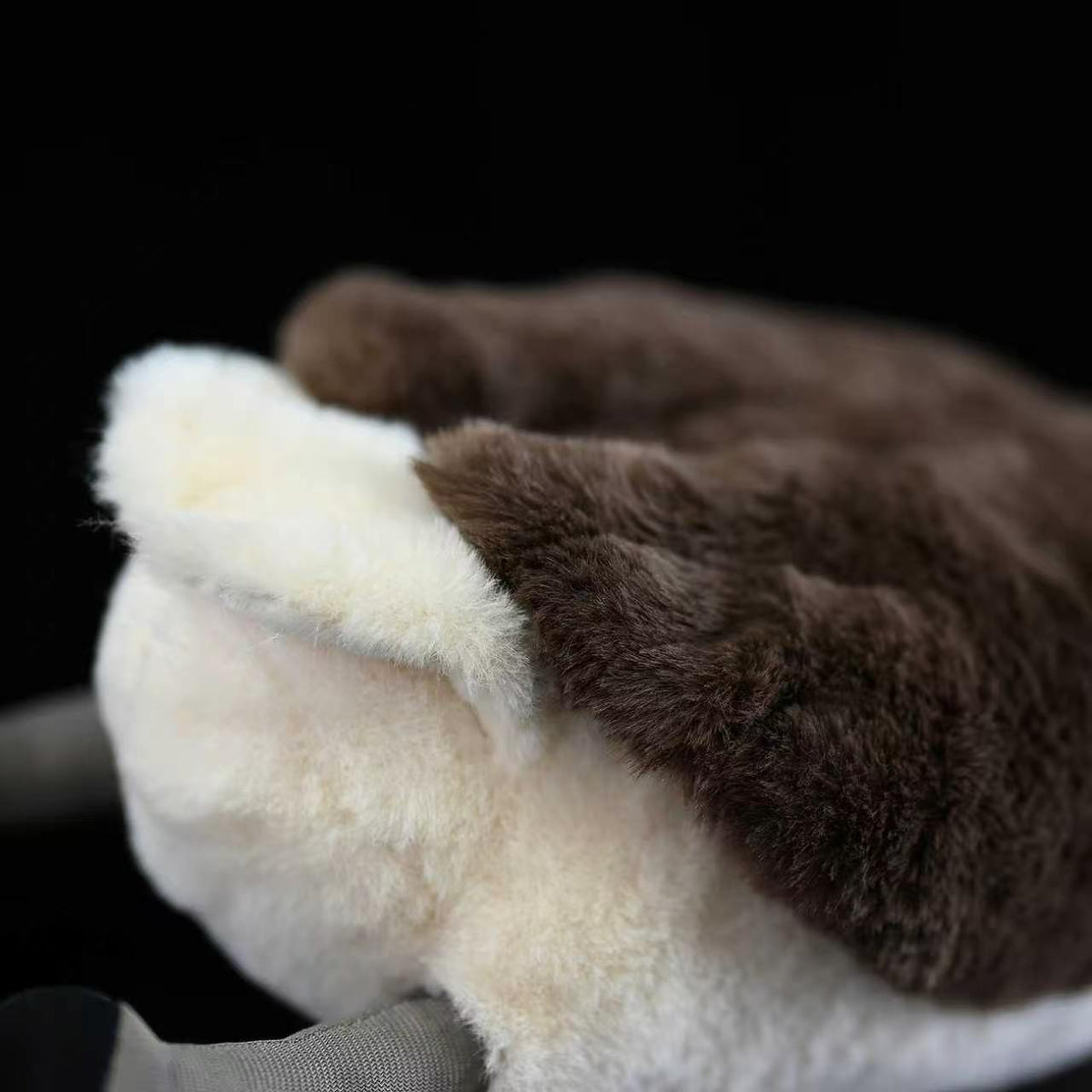 Detailed close-up of Little Grebe plush's soft and fluffy tail, crafted for a lifelike appearance