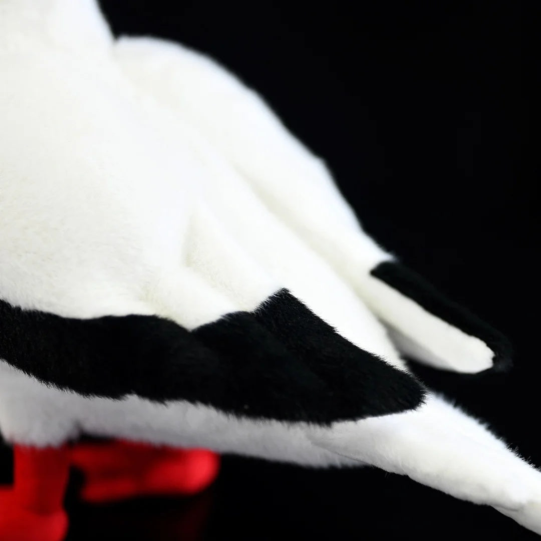 Detailed close-up of the Red-footed Booby plush tail, showing black and white feather textures by SoftDaysLab
