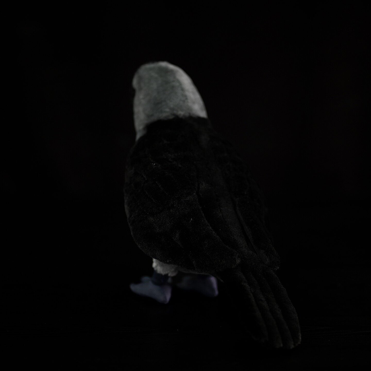 Rear view of Western Jackdaw plush with beautifully crafted black feathers and a realistic silhouette