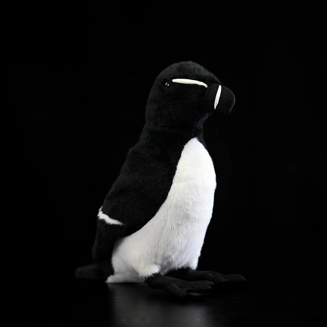 Angled view of the lifelike Razorbill plush by SoftDaysLab®, featuring detailed seabird-inspired features